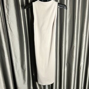 Elegant Fitted Cream Sleeveless Dress